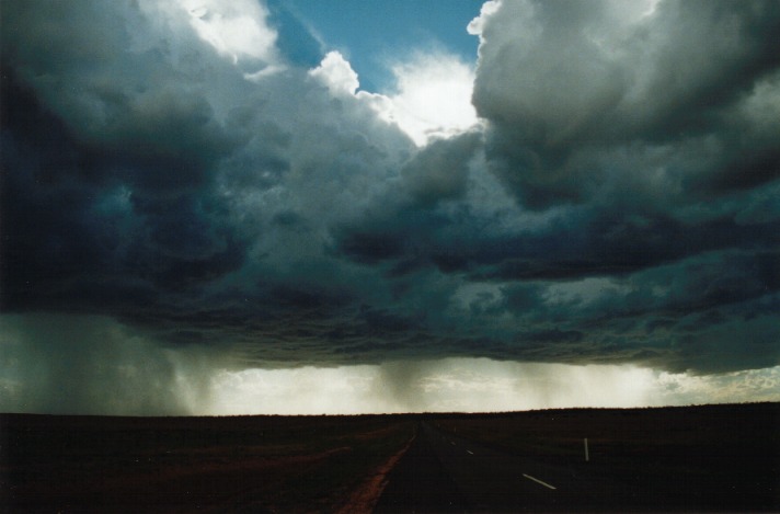 cumulonimbus thunderstorm_base : W of Mitchell, Qld   21 November 1999