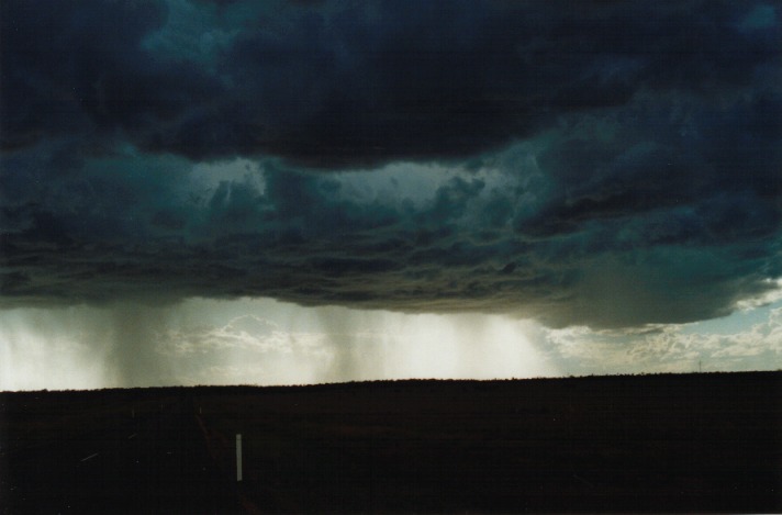 cumulonimbus thunderstorm_base : W of Mitchell, Qld   21 November 1999