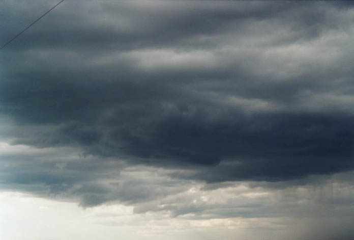 cumulonimbus thunderstorm_base : W of Inverell, NSW   4 December 2000