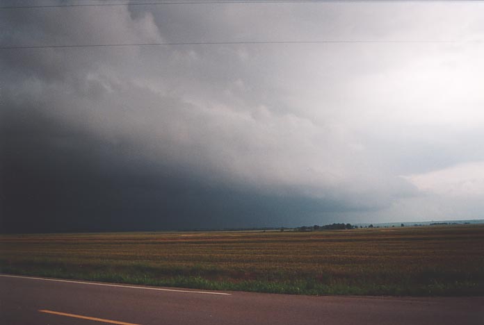 cumulonimbus thunderstorm_base : SW of Elk City along route 283 Oklahoma, USA   19 May 2001